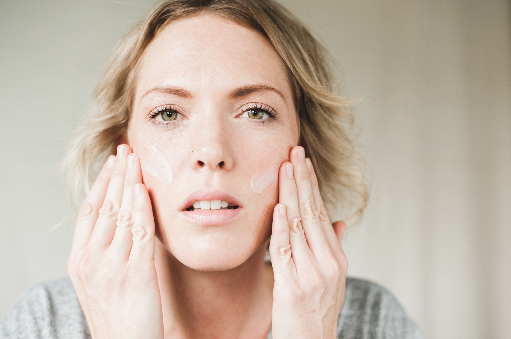 Woman doing a Skintuitive Facial Massage Practice 