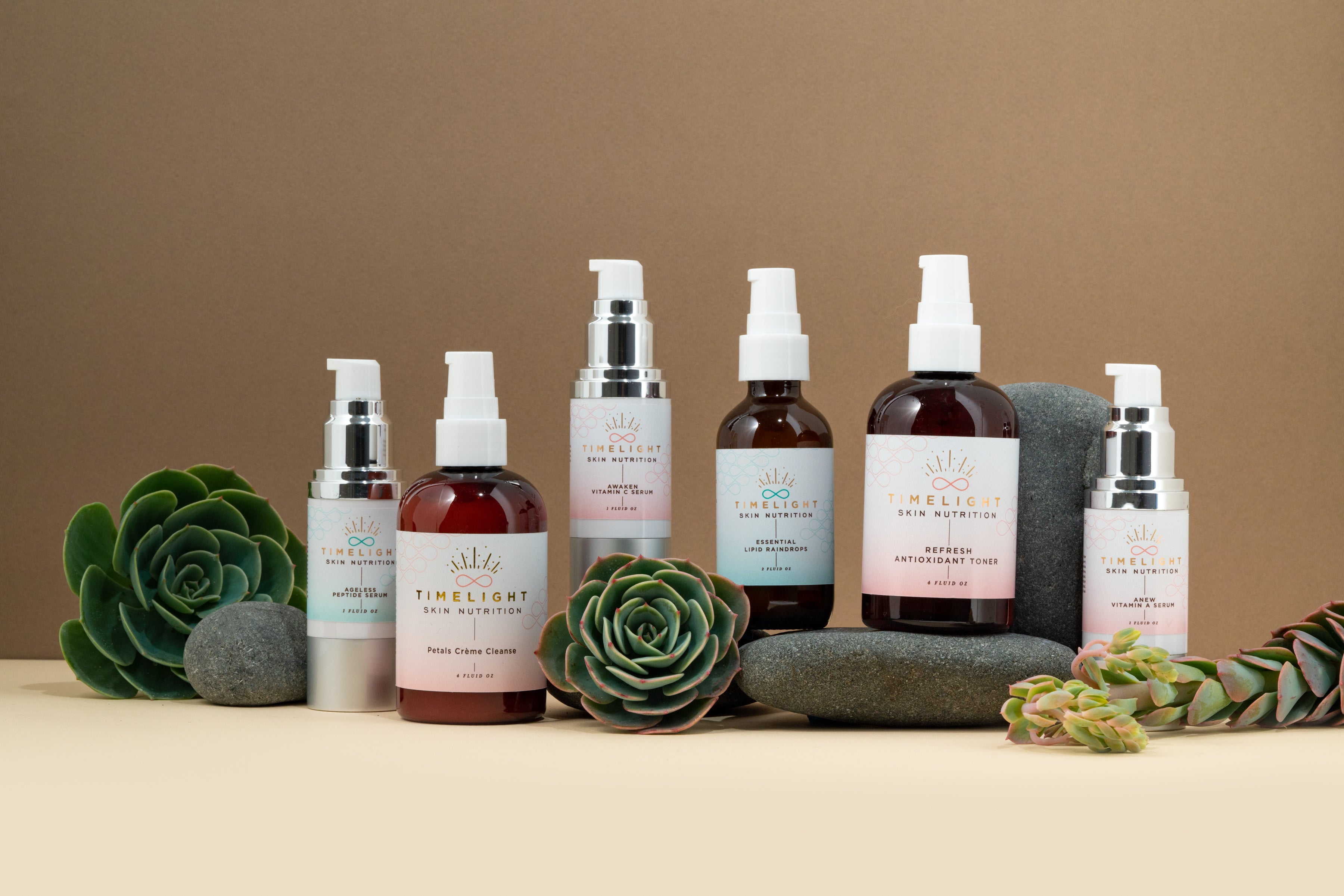 "TimeLight Skin Nutrition Collection products, including Electrolytes, Retinaldehyde Slow Release Vitamin A, Argireline Peptide, L-Sodium-Hyaluronate, L-Ascorbic Acid, Acetyl Glutathione, Phospholipids & Royal Jelly, preserved with Organic Honeysuckle."